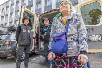 A person attending a hygiene kit distribution by prosper global ukraine parter organization pomogaem charitable trust.