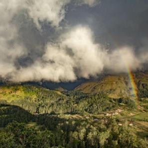 Rainbows forming over the rugged mountains of timor-leste.