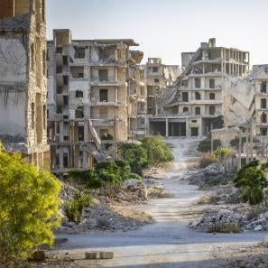 Damaged buildings line the streets, in an area on the outskirts of aleppo that was heavily bombarded during the civil war.