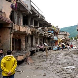 People assess damage in rasuwa district, bagmati province in the wake of the devastating flood in northern nepal.