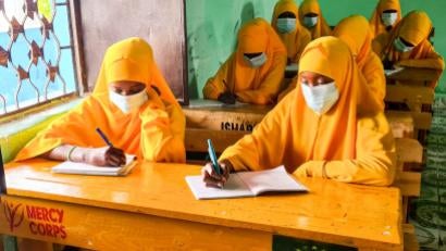 In Somalia, decades of conflict combined with the pandemic have disrupted education — especially for girls. With support from Prosper Global, children are now putting health guidelines into practice and class is in session.