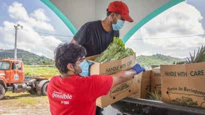 Prosper Global partnered with a community organization to deliver boxes of locally harvested crops to families who had lost income due to the COVID‑19 pandemic.